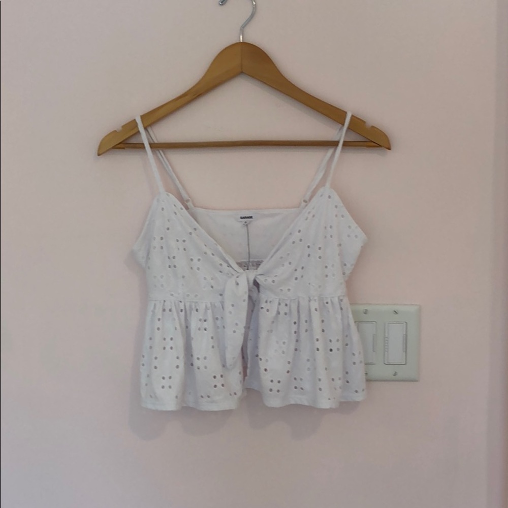 NEVER WORN Garage eyelet peplum top